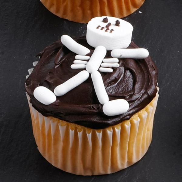Kauhu muffinsseja leivonta halloween leivonnaisia ​​cupcakes luuranko