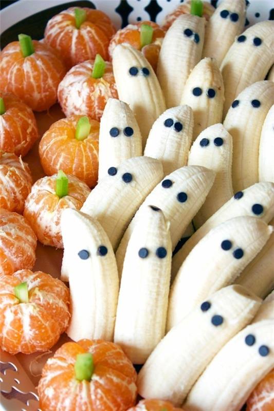Halloween ruoka lapsille terveelliset välipalat sormiruoka kylmä banaani haamuja appelsiinit