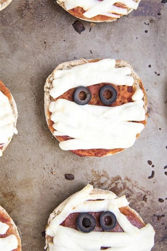 Halloween -välipaloja lapsille runsas sormiruoka pizza -aaveita