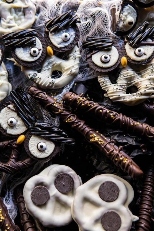Halloween -välipalat lapset makea sormi ruoka kylmä suklaa pretzel pöllö