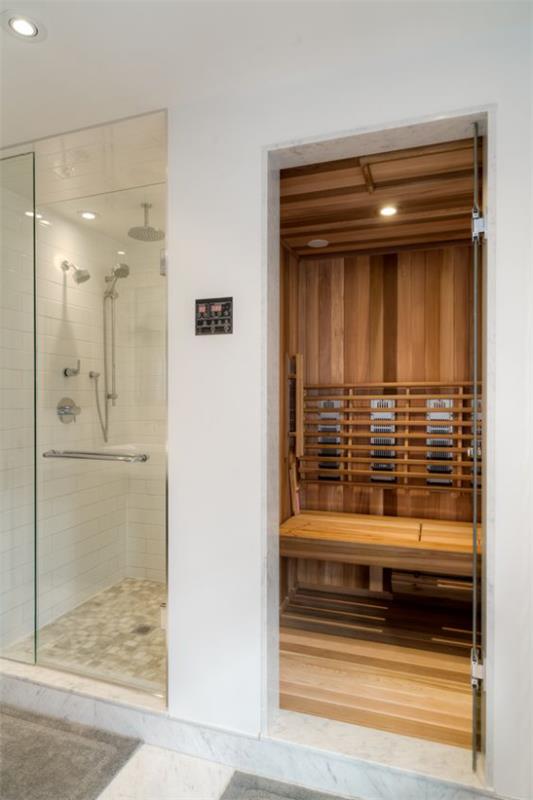 Kotisaunat, moderni trendi, saunat kotona suihkun vieressä lasiseinän takana