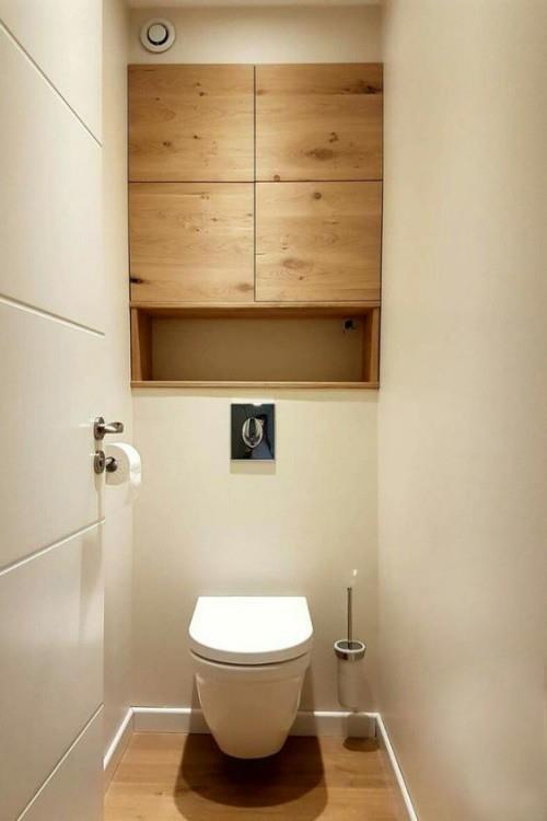 Puu kylpyhuoneessa yksinkertainen muotoilu suuri visuaalinen vaikutus puukaappi puulattia