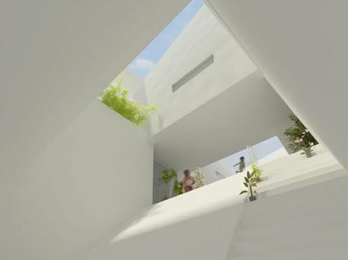 Talot upeilla kattorakenteilla ja minimalistisilla kattoikkunoilla