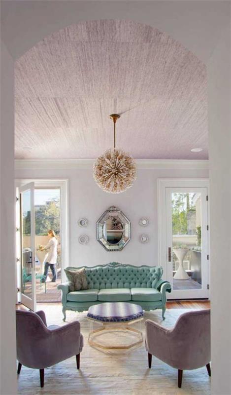 Sisustussuunnittelu minimalistisia asumisideoita - vihreä sohva retro