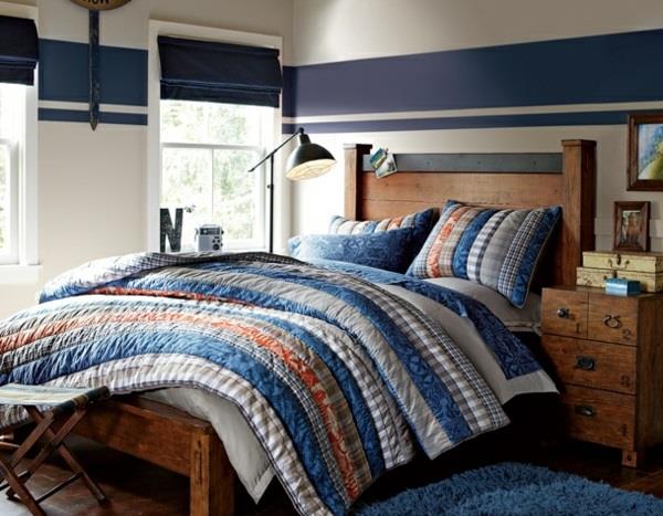 Yhdistelmät merenkulkutyylisistä seinän väreistä makuuhuoneen sänky