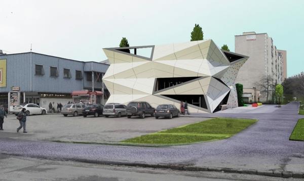 Kulttuurikeskuksen ja urheilukeskuksen rakennusrakenne, valkoinen julkisivu, kulmikas