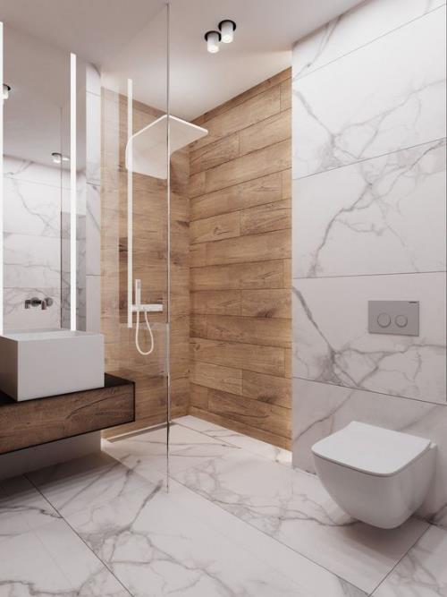 Marmori kylpyhuoneessa marmorilaatat harmaa lasiseinäsuihku puuta lämmin kosketus