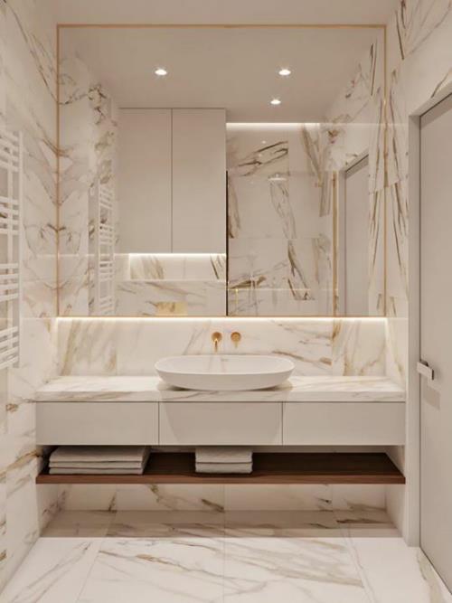 Marmori kylpyhuoneessa marmorilaatat kaunis kylpyhuone muotoilu beige turhamaisuus peili sisäänrakennetut valot