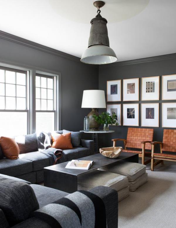 Maskuliininen ja tyylikäs moderni olohuone harmaa värit aksentti seinään kuvia ylevä tyyliin