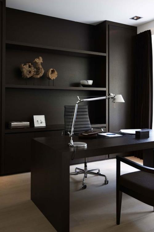 Maskuliininen kotitoimisto minimalistisilla kalusteilla, erittäin houkutteleva ja kutsuva