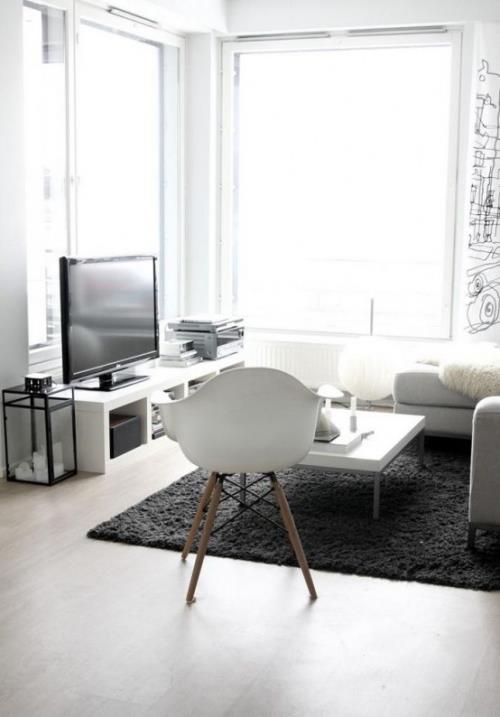 Minimalismi olohuoneessa pieni huone täydellinen sisustus tyylikäs ulkoasu erittäin houkutteleva muotoilu