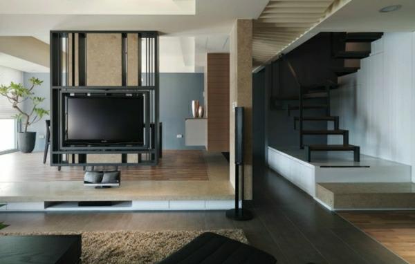 Moderni minimalistinen olohuone ja eteinen