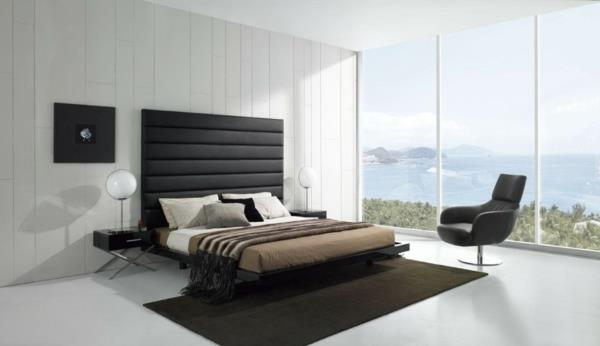 Minimalistiset vuoteet makuuhuoneideat matto ruskea ikkuna meri