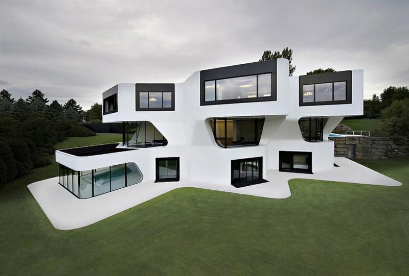Moderni arkkitehtuuri Rakenna taloja Arkkitehtitalo innovatiivinen muotoilu