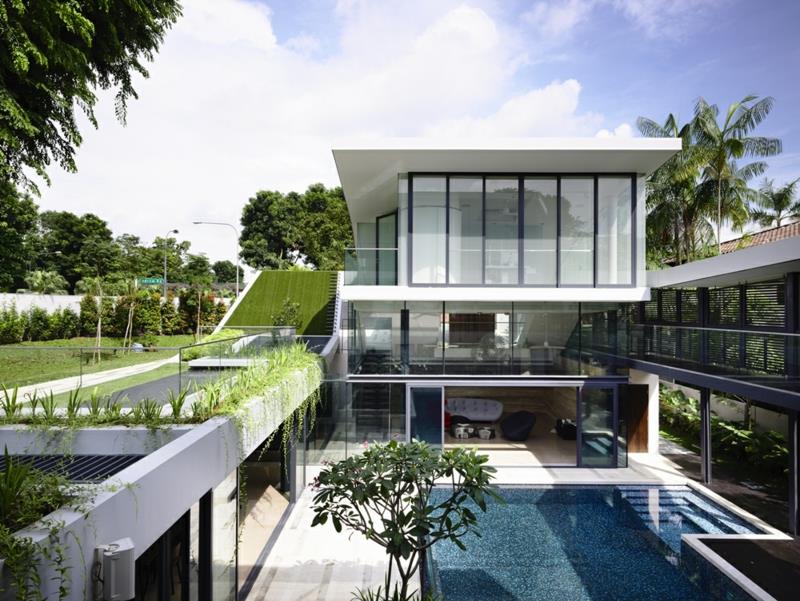 Nykyaikaiset talot rakentavat arkkitehtitaloja kattoterassi viherryttävä puutarha -allas