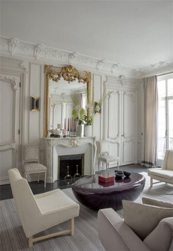 Pariisin tyylikäs olohuoneessa moderni tunnelma pyöreä marmoripöytä takka peili