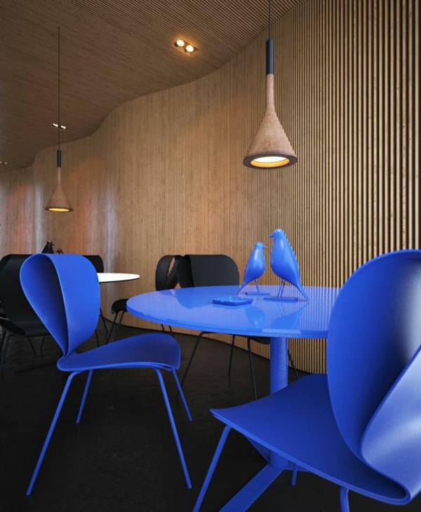 Pyöreä trendikäs ruokapöytä sininen rakenne lakkaravintola