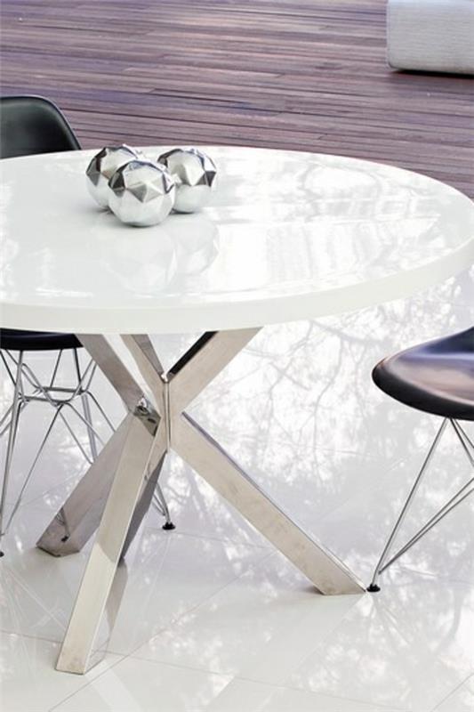 Pyöreät metallivaikutteiset ruokapöydät, joissa on kiiltävä virta
