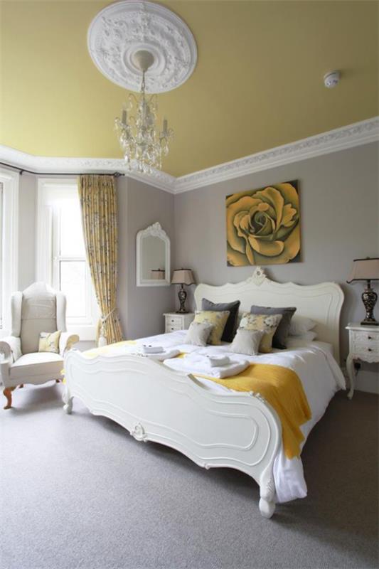 Makuuhuone ideoita harmaa ja keltainen tilava makuuhuone iso mukava sänky