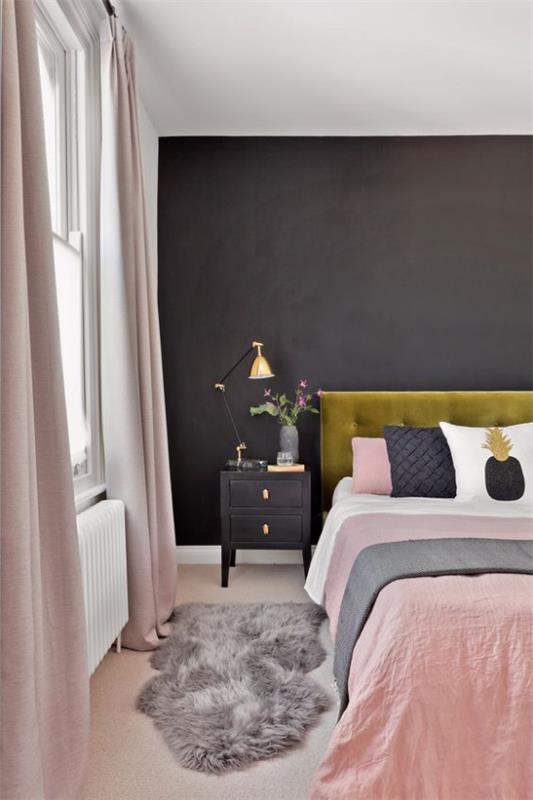 Makuuhuone ideoita musta ja vaaleanpunainen kirkas sisustus musta seinä ruoho vihreä sänky pääty vuodevaatteet vaaleanpunainen valkoinen harmaa pieni matto tekoturkista