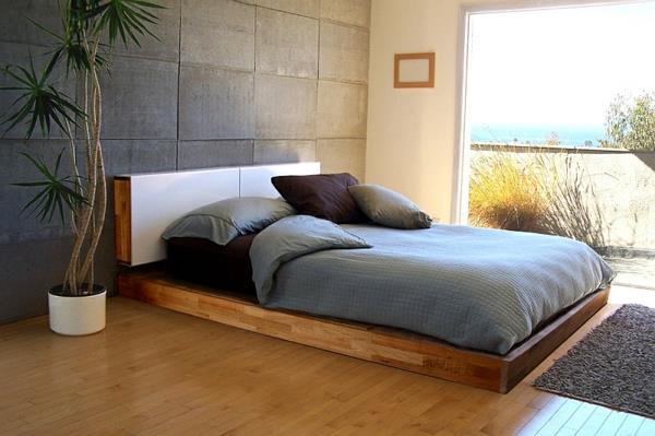 Makuuhuoneen minimalistinen sisustus eksoottinen ovimatto pehmeä