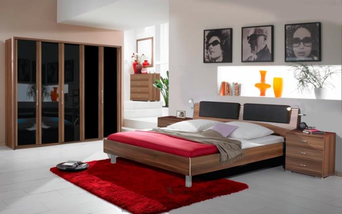 Makuuhuoneen suunnitteluideat beige aksentti -seinäsängyn matot punainen