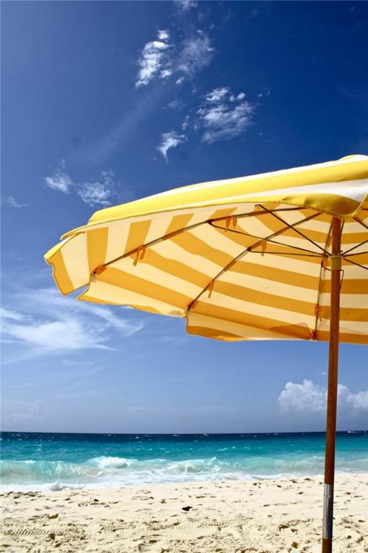 Aurinkovarjot ranta aurinkosuoja meri loma tarvikkeet