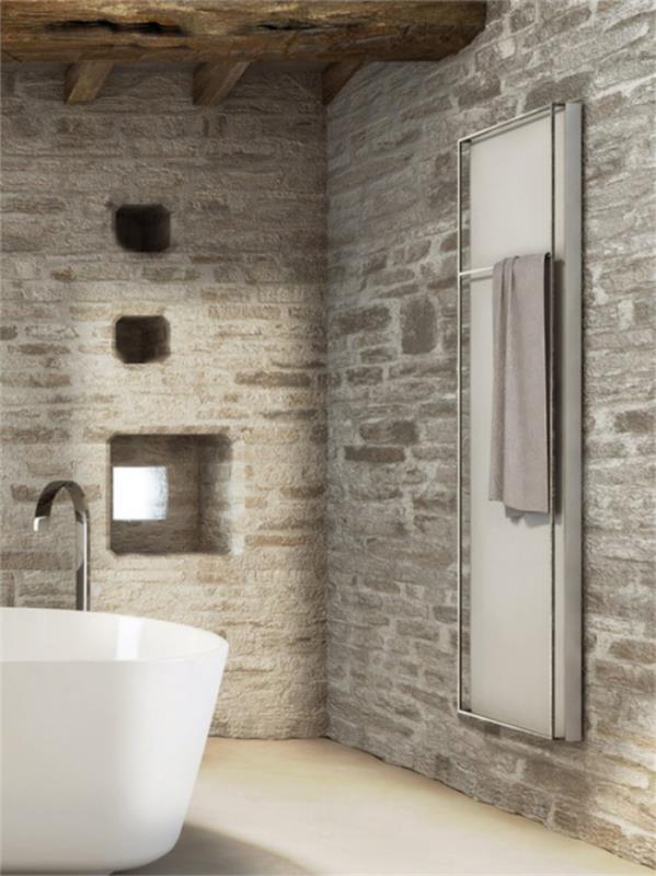 Kivi kylpyhuoneessa Kiviseinät harmaa moderni kylpyamme maalaismainen ja luonnollinen