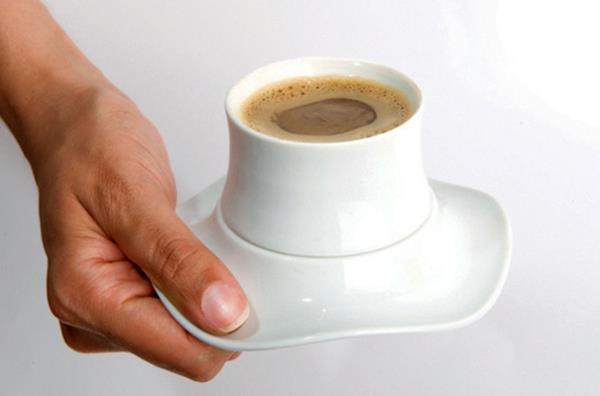 Kuppi kahvia kuvia valkoinen muotoilu lautanen