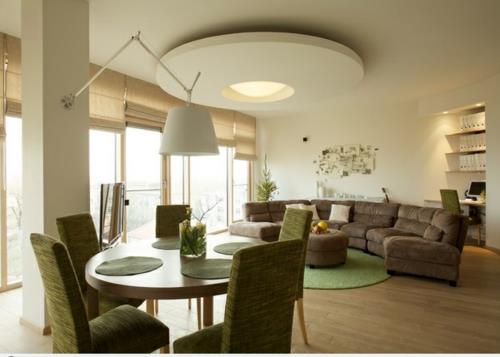 kattopaneelit olohuoneessa modernit alkuperäiset trendikkäät vihreät pehmustetut huonekalut