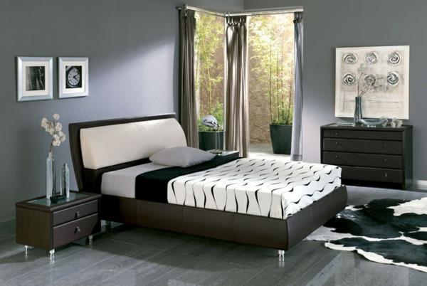 Seinämaali harmaan sävyissä moderni sänky makuuhuone