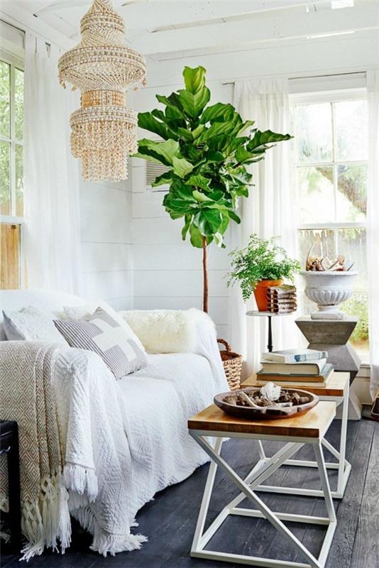 Kodin tarvikkeet modernissa olohuoneen sisäkasveissa vihreä kosketus valkoinen sisustus