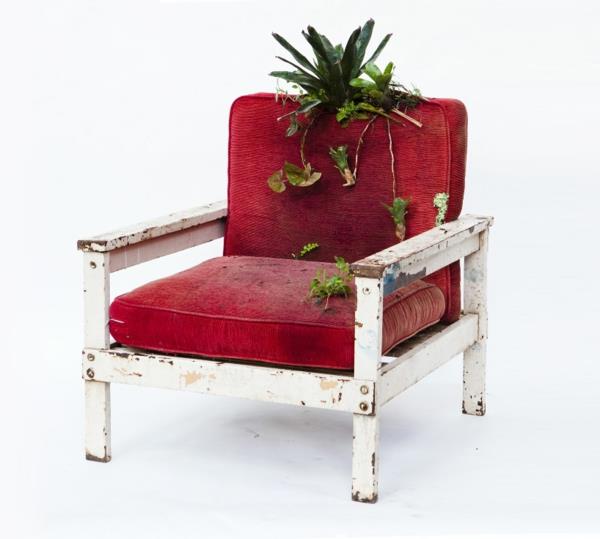 ruukkukasvit viljelevät istutettuja pehmustettuja huonekaluja punainen nojatuoli