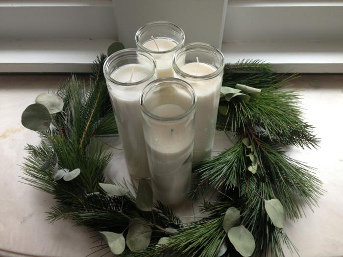 ideoita advent -seppele jouluseppele valkoiset kynttilät koriste -ideat joulupöydän koristelu