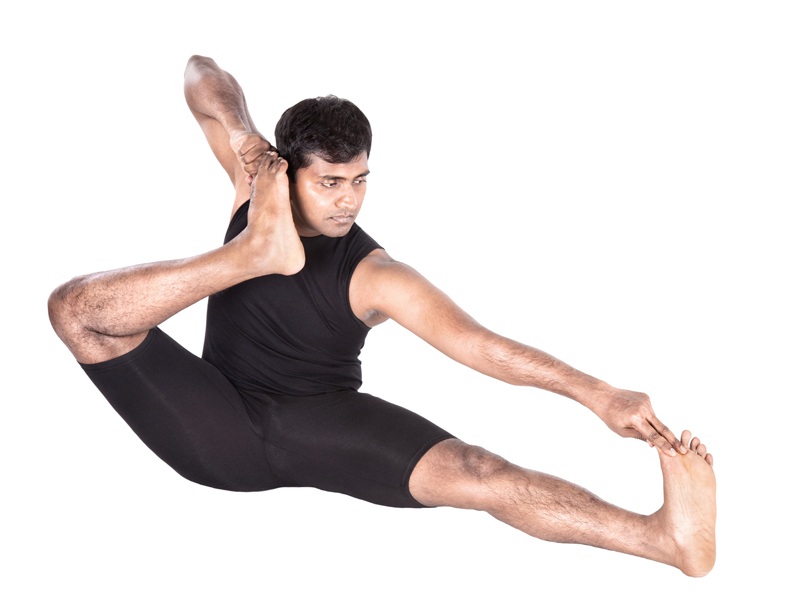 Akarna Dhanurasana (bueskytterpose) Sådan og fordele