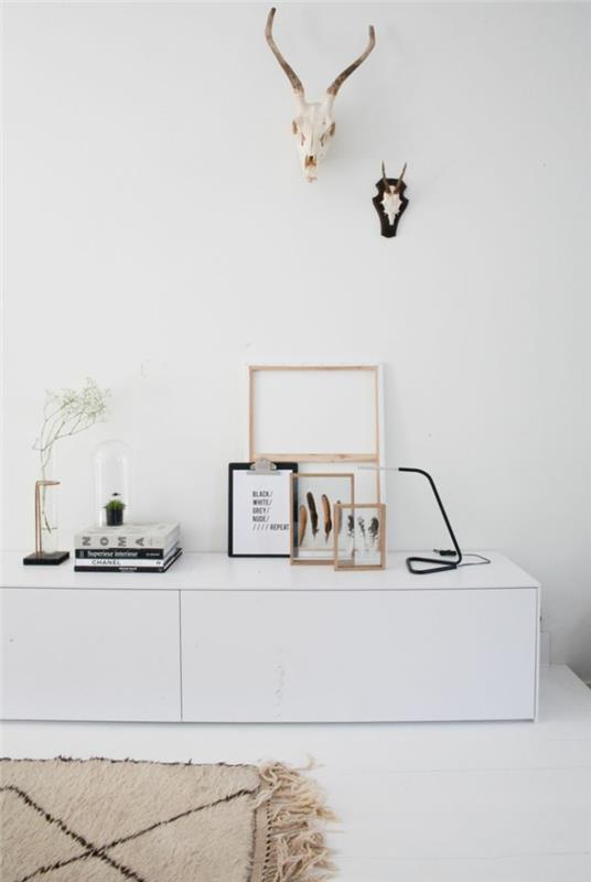 sideboard koristelu puristinen koristelu valkoinen lipasto sideboard table people kuvakehys puu yrtit