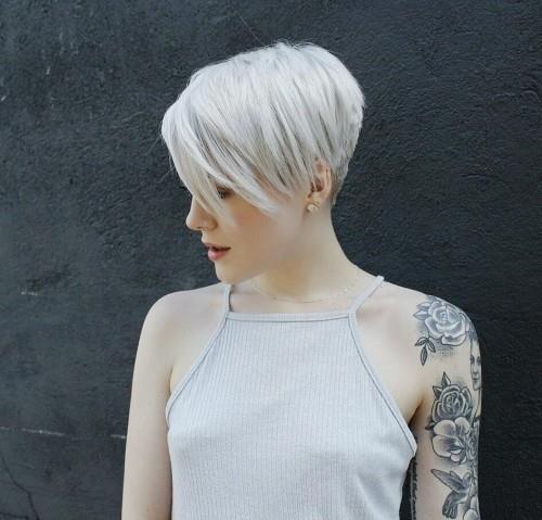 Epäsymmetrinen kampaus yli valkoisen epäsymmetrinen kampaus valkoinen