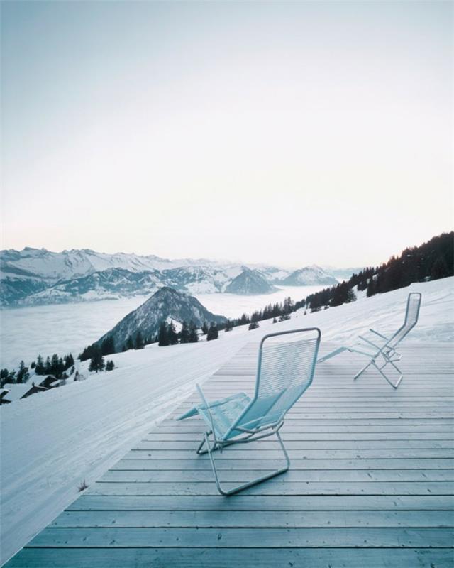poikkeukselliset loma -asunnot sveitsi vuoristotalo lumi maisema
