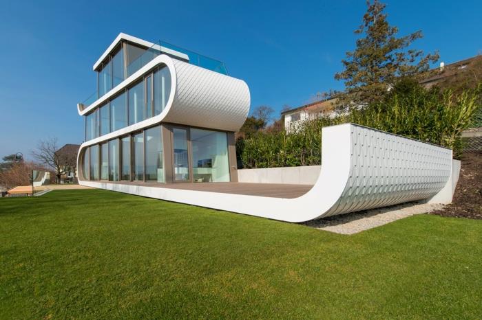 poikkeukselliset loma -asunnot sveitsi aallot moderni arkkitehtuuri orgaaniset muodot