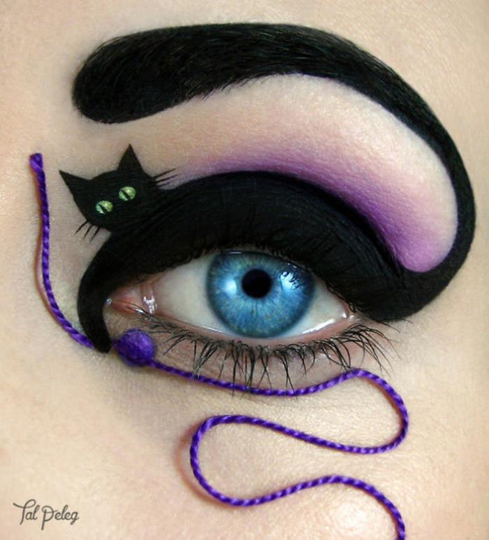 Meikkitaiteilija Tal Peleg kissa leikkii langalla ja tekee silmille meikkiä