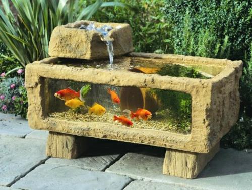 epätavallinen puutarhan koristelu akvaario kivet