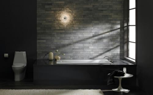 kylpyhuoneen kalusteet musta kylpyamme minimalistinen tyylikäs