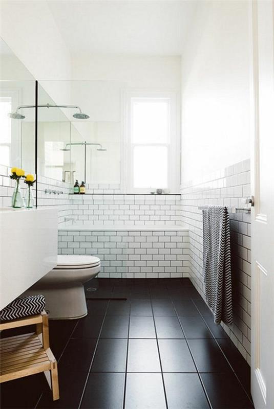 kylpyhuoneen laatat laatat värit seinälaatat valkoinen lattialaatat musta