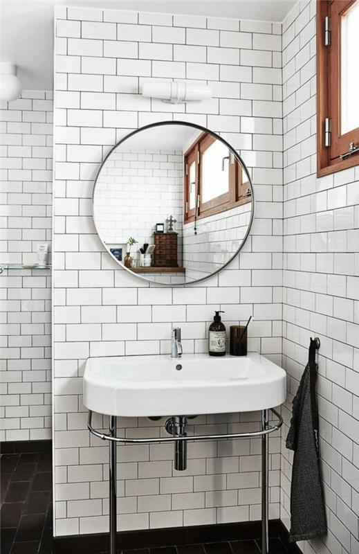 kylpyhuone ideoita kylpyhuone laatat valkoinen seinälaatat tummat lattialaatat pyöreä seinäpeili