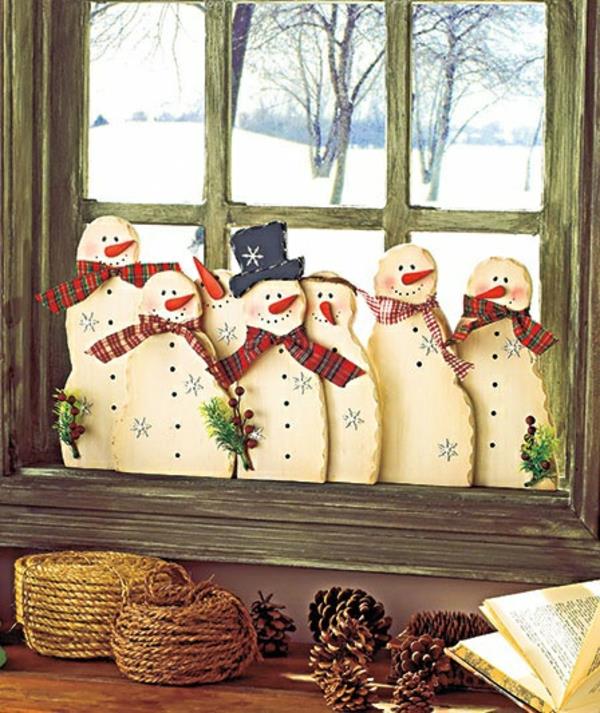 Käsityöideoita ikkunan joulukoristeisiin lumiukko