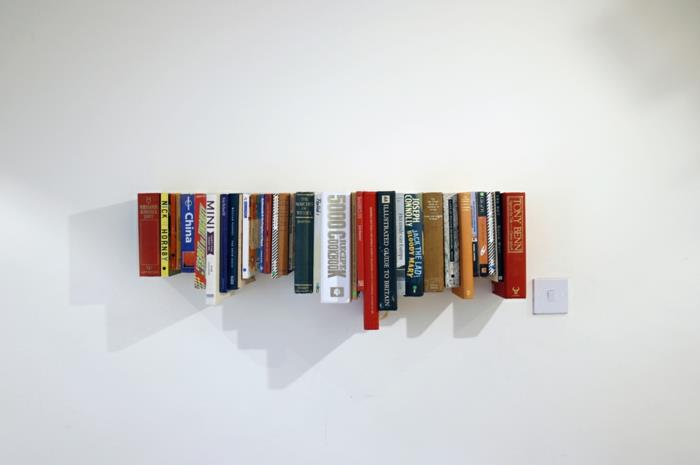 kirjahyllyt luovat elävät ideat kirjat järjestävät seinän