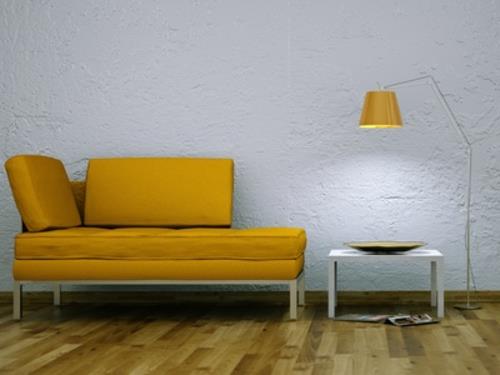 Valaiseva sohva tekee oranssista