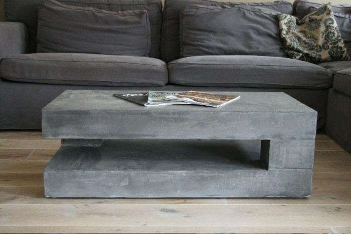 betoninen sohvapöytä harmaa karkea pinta minimalistinen