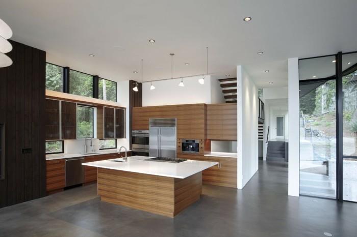 betonilattia moderni keittiö kauniit puukuviot valkoiset pinnat