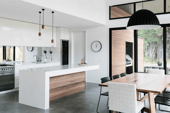 betonilattia moderni keittiölaite valkoiset seinät